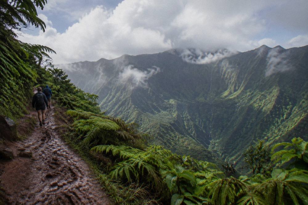 Clouds drifting over green ridges above the Kauai interior